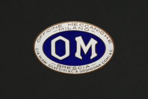 OM (Officine Meccaniche) emblem. (source: Radiator Emblem Collection)