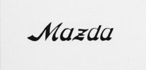 1934 Mazda logo. This mark became the registered trademark for Mazda when production commenced on our three wheel trucks. The name "Mazda" represents a combination of "Ahura-Mazda", the name of an ancient god, and Jujiro Matsuda, founder of the Mazda Corporation.